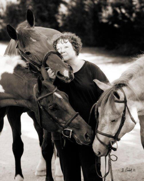 S. E. Hinton with her horses.
